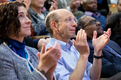 audience members clap during the State of the University address