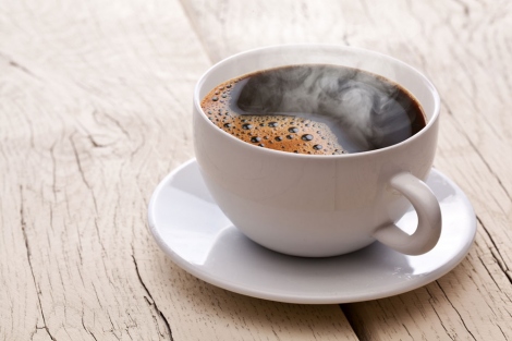 stock image of hot coffee in a cup and saucer