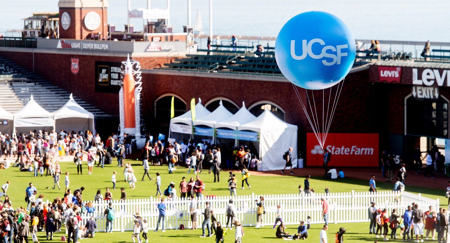 a balloon with UCSF logo over Oracle Park field