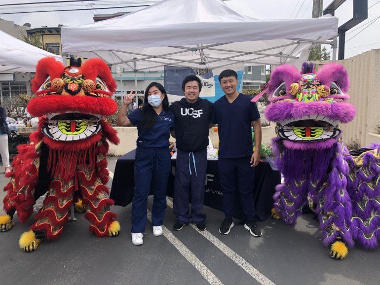 The UCSF Chinese Dental Students Association attend the Sunset Autumn Moon Festival to show kids how to brush properly.