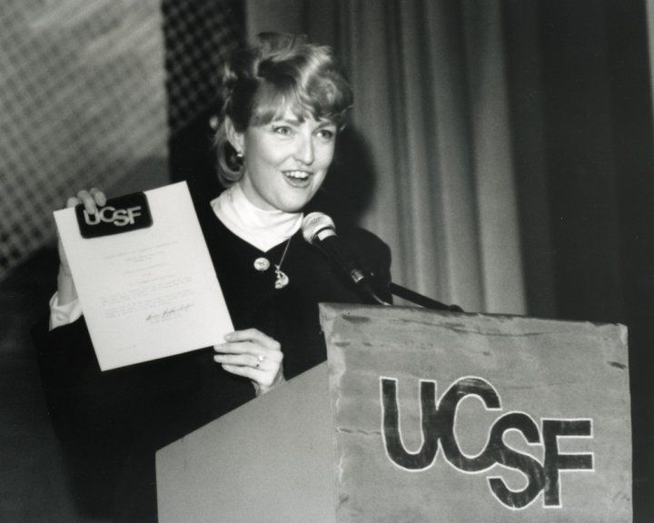 Millie Hughes-Fulford speaking at a podium in 1992