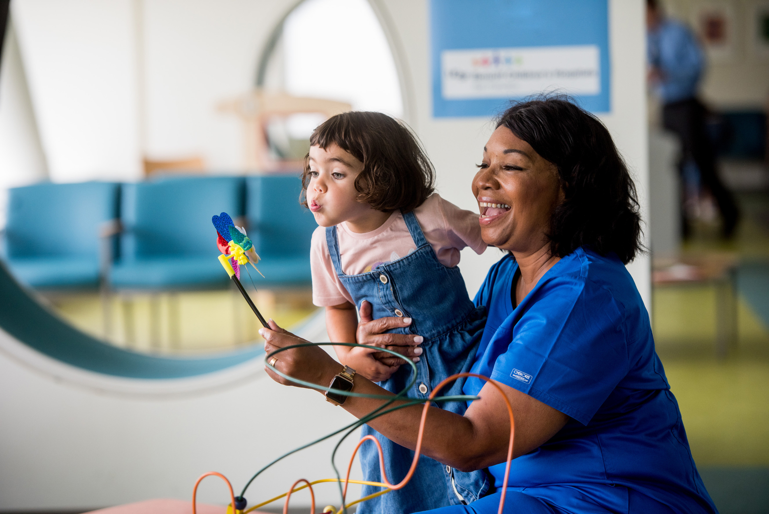 Nurse plays with child