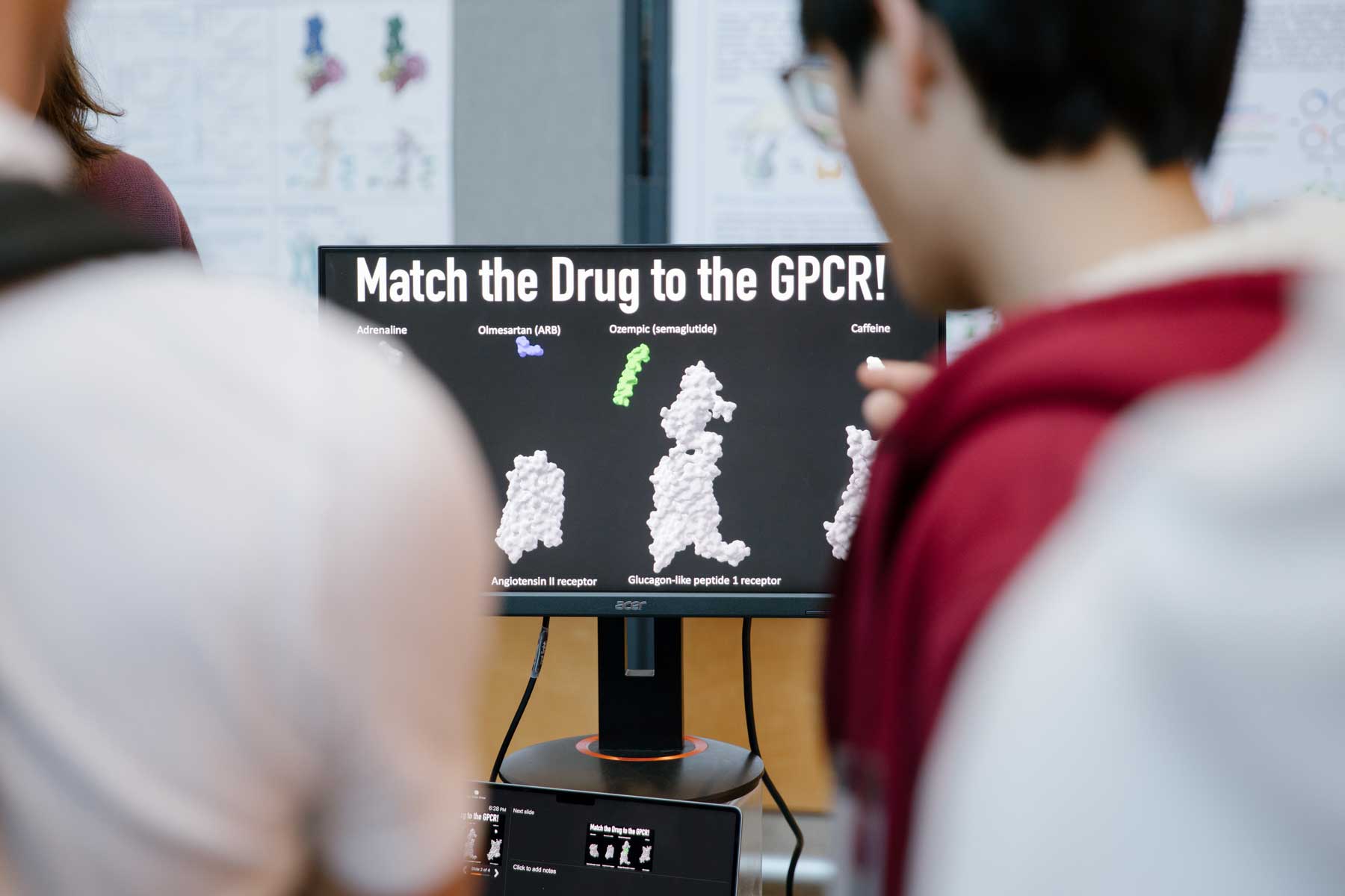 An interactive computer game where particpants match a drug such as caffeine or Ozempic to a G protein-coupled receptor (G C P R).