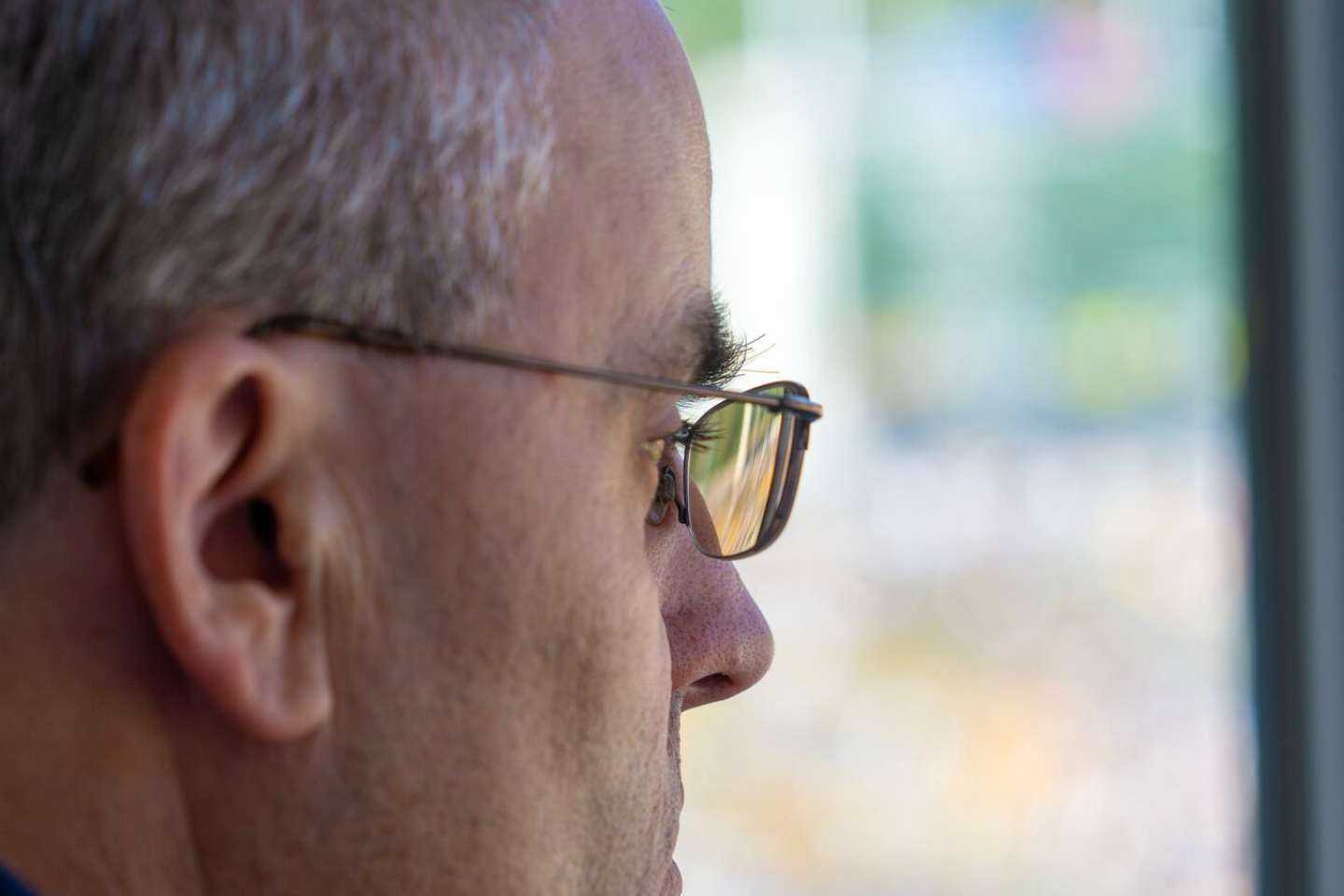 Doug Carlson overlooks the arena from his seat.