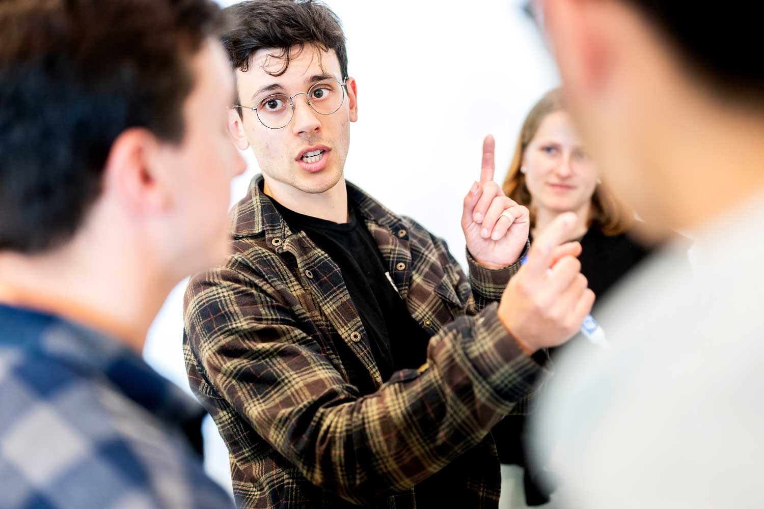 Adam Yala, an assistant professor at the Computational Precision Health program, speaks with students.