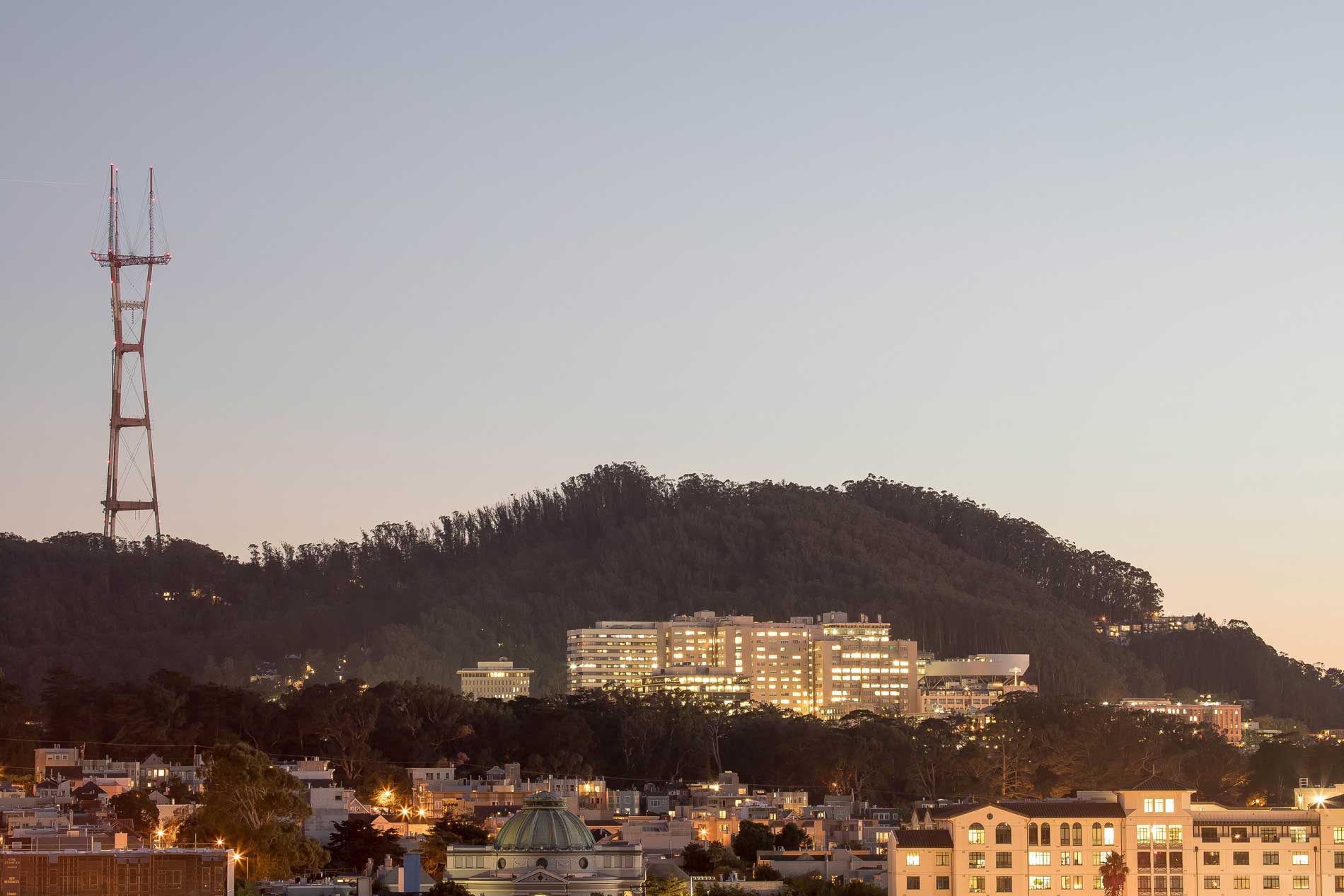 The Parnassus Heights campus and Mount Sutro at dusk.