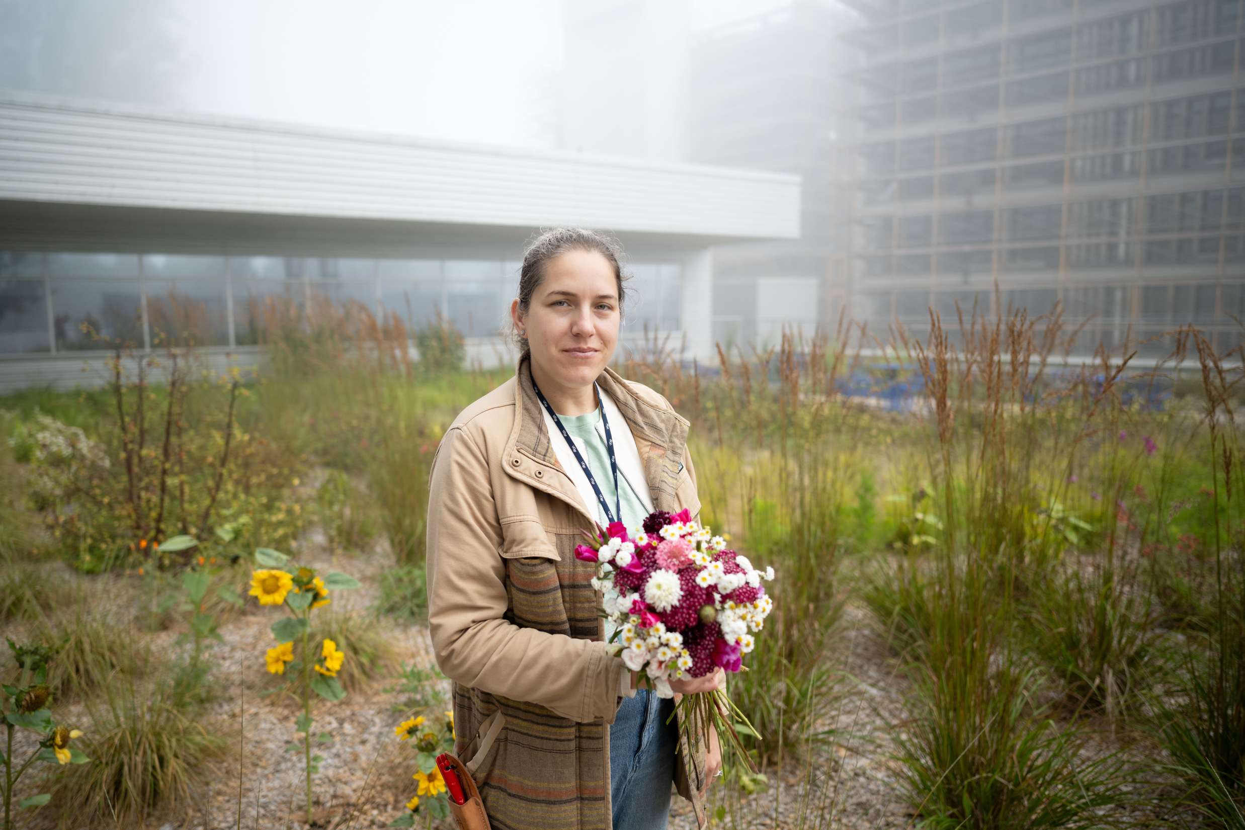 Cassandra Belair stands in outdoor garden.