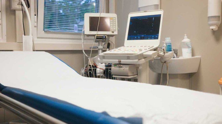 An ultrasound machine and an examination bed at a clinic.