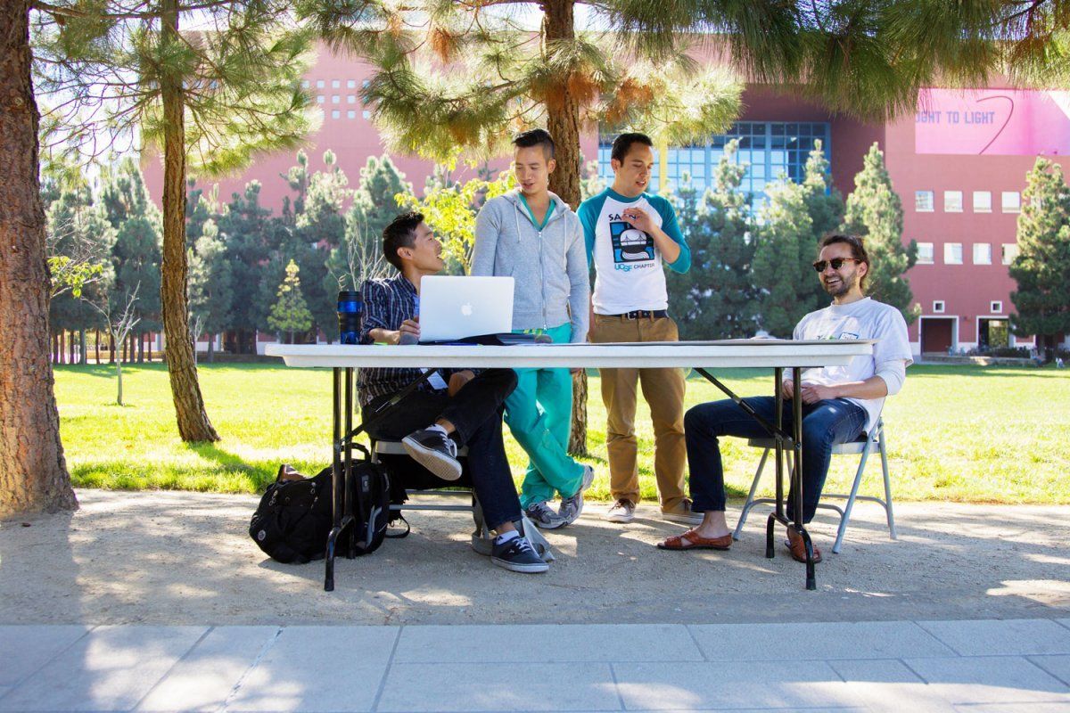 Students at the outdoor table