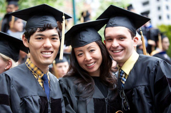Three students at 2012 School of Medicine graduation